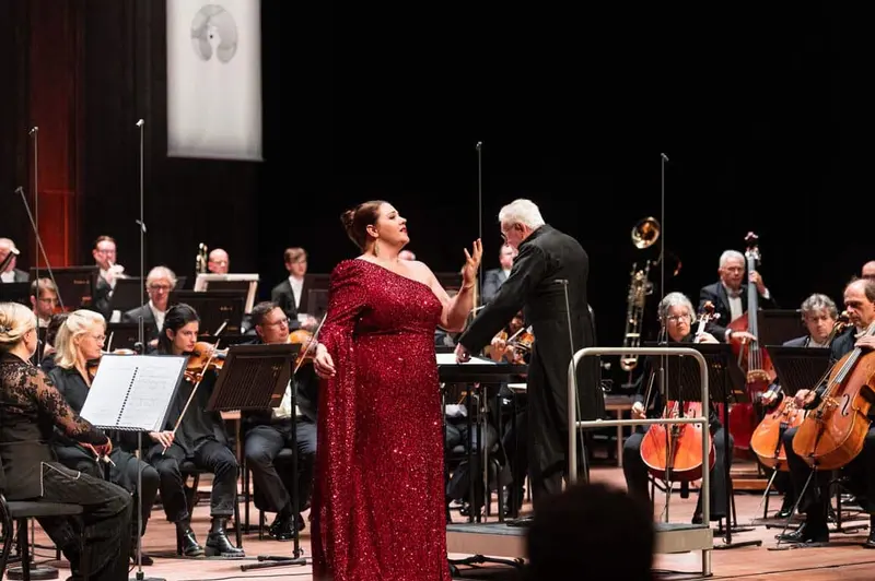 A singer performing at the International Vocal Competition