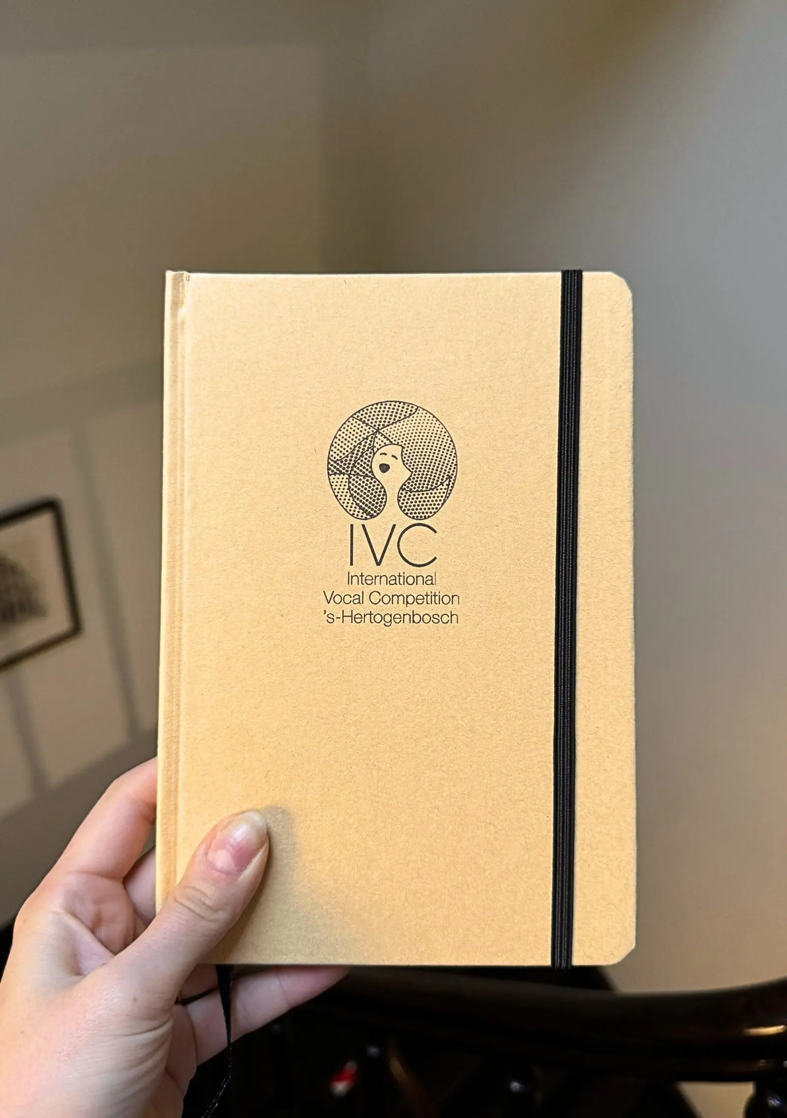 IVC A5 notebook held in hand